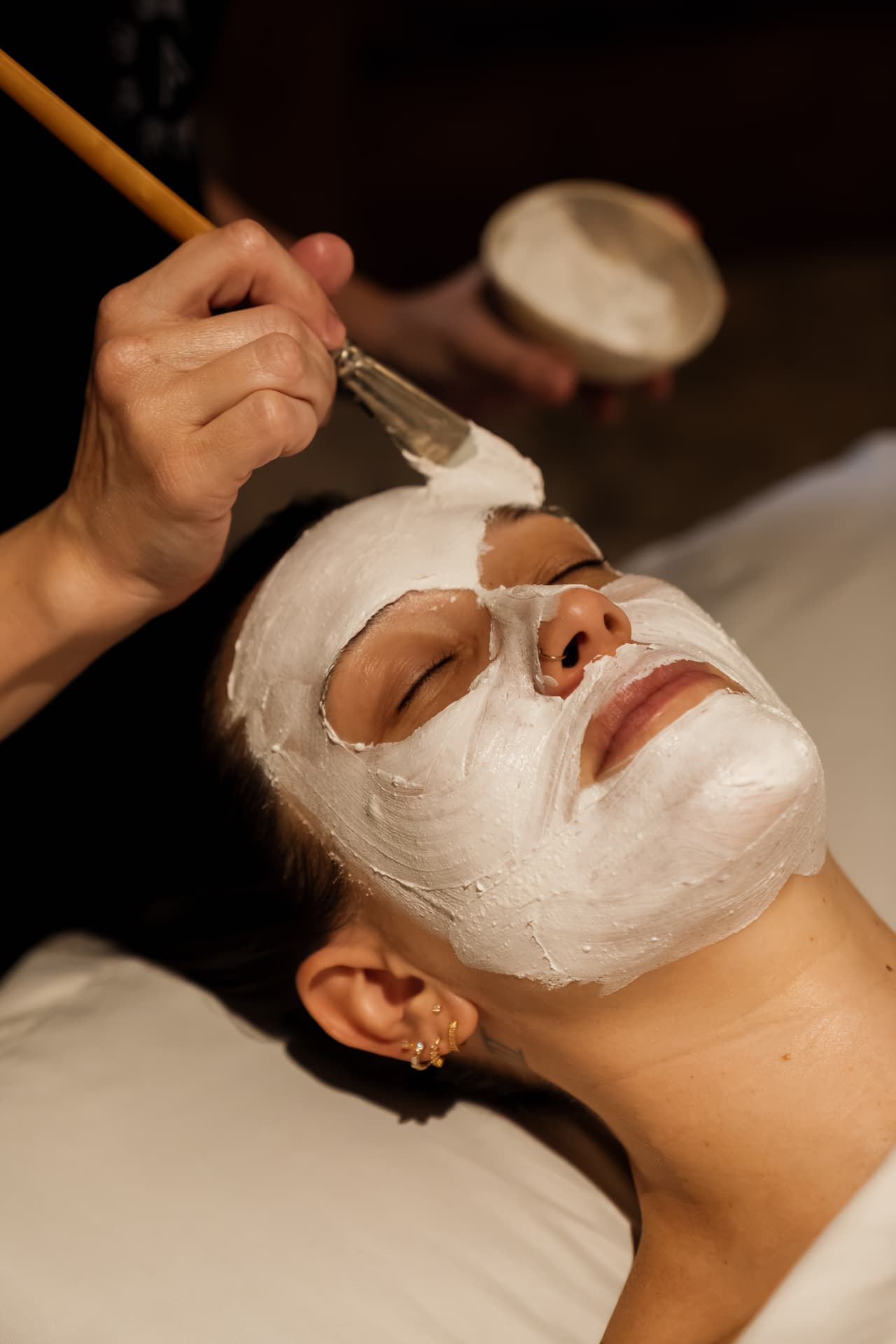 Facial treatment with botanical skincare products