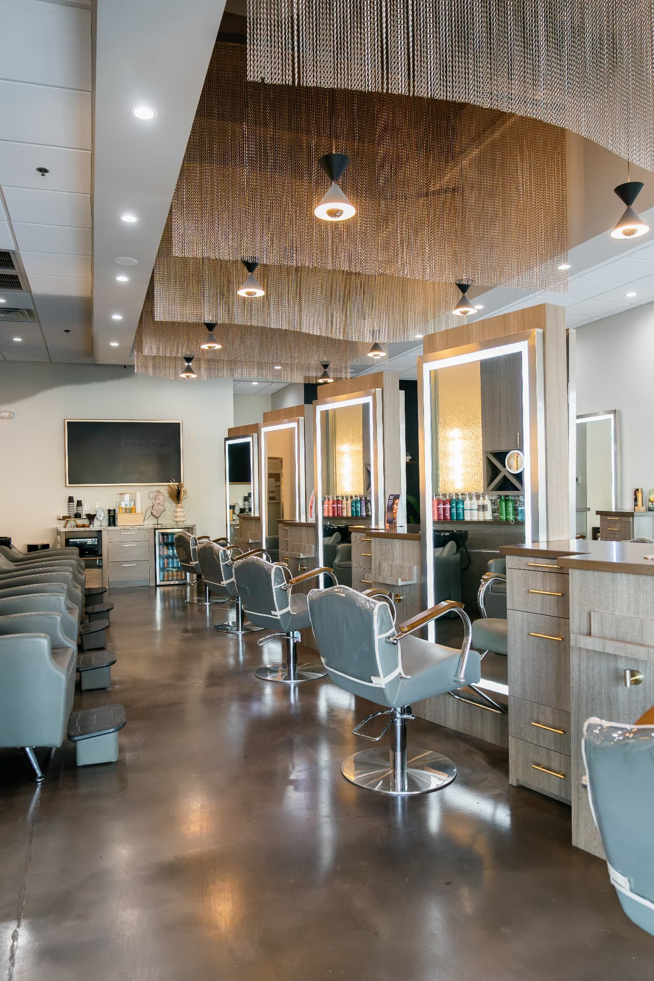 Scottsdale salon floor with lighted styling mirrors and chairs