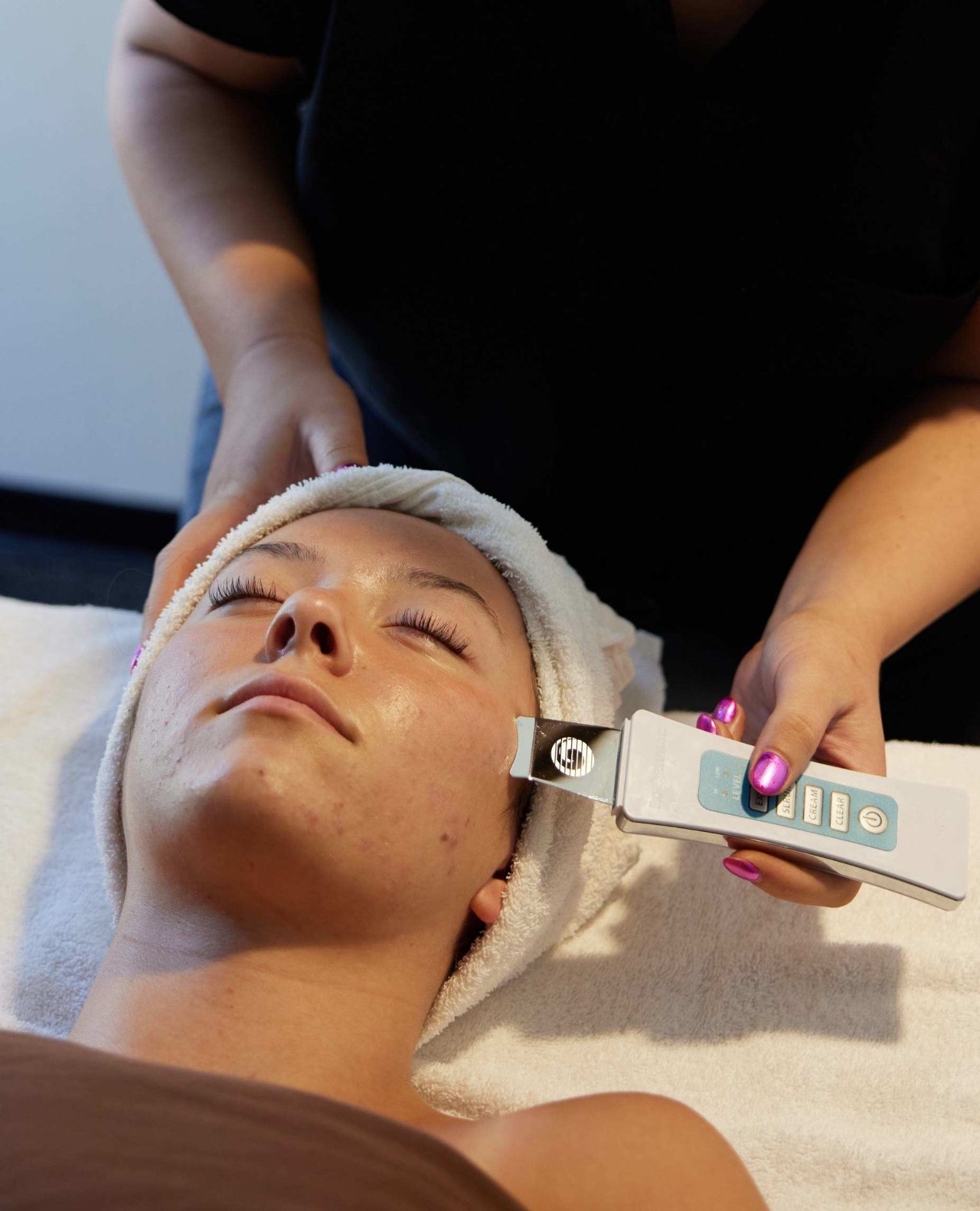 Ultrasonic facial treatment in the spa suite